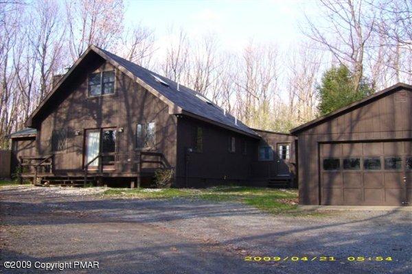 153 Little Twig Road Effort, PA 18330 - Photo 1 of 22 a front view of a house with a yard