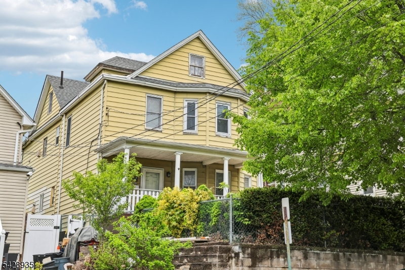 50 Preston Street Ridgefield Park, NJ 07660 - Photo 3 of 41 front view of a house with a yard