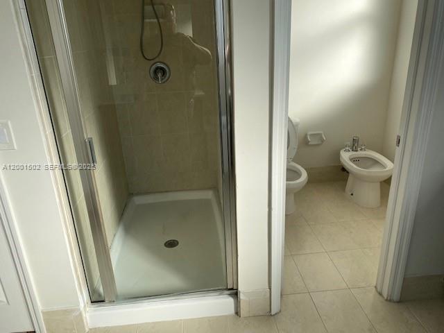 16568 Southwest 54th Street Miami, FL 33185 - Photo 13 of 30 a bathroom with a granite countertop shower