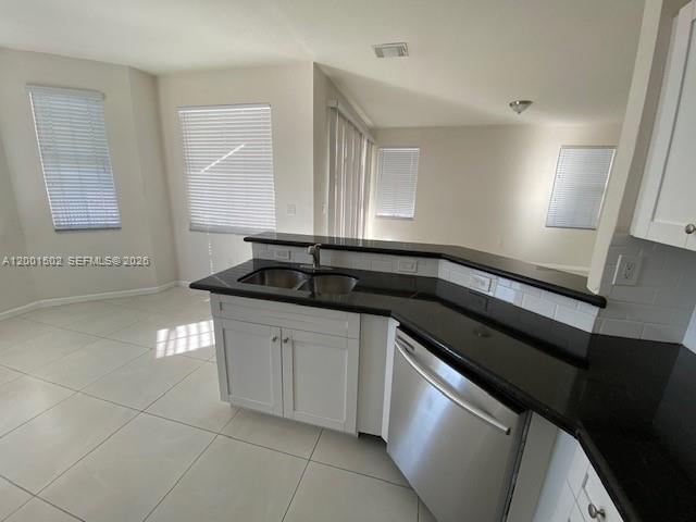 16568 Southwest 54th Street Miami, FL 33185 - Photo 17 of 30 a kitchen with a sink and cabinets