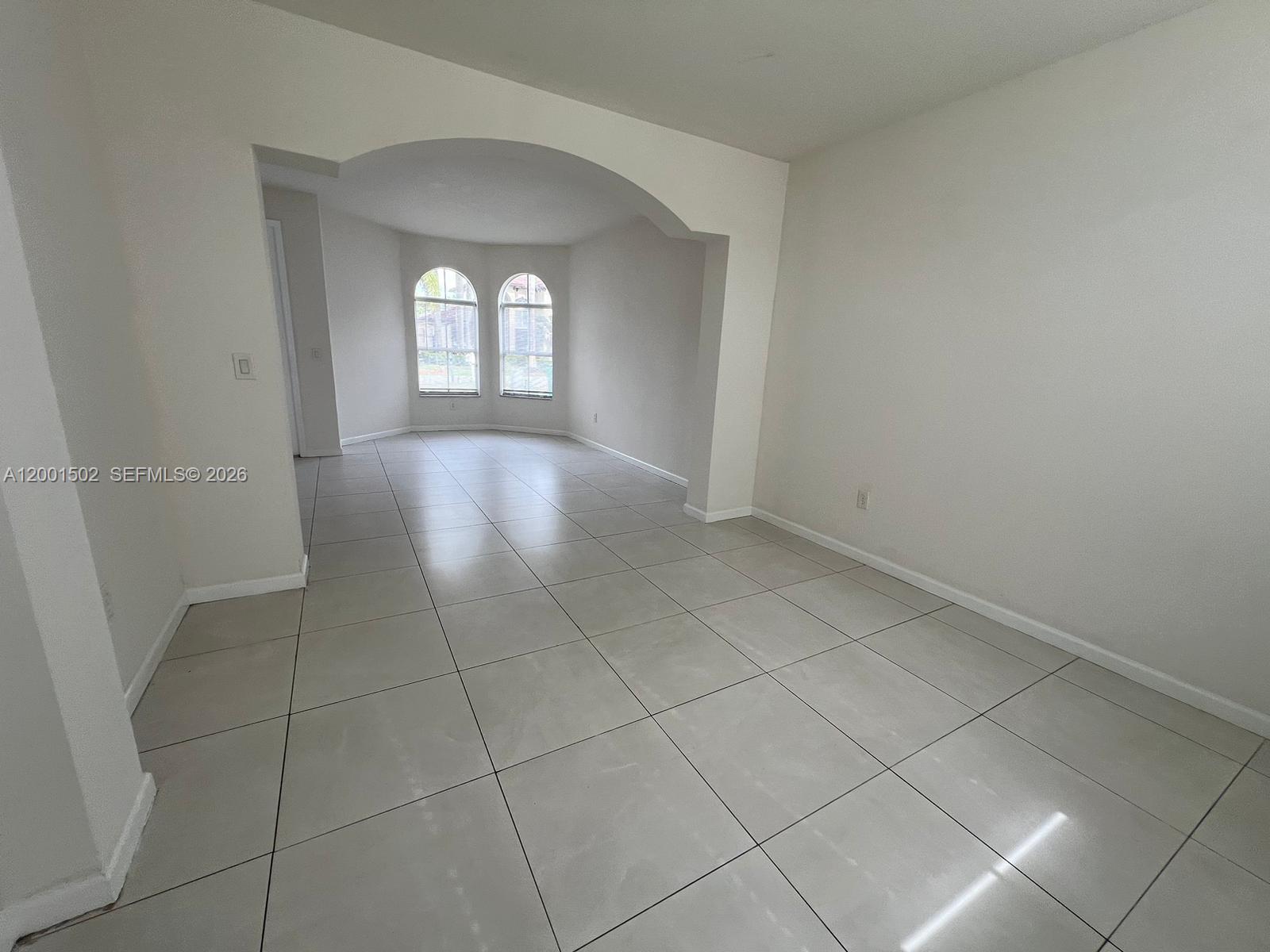 16568 Southwest 54th Street Miami, FL 33185 - Photo 22 of 30 an empty room with windows