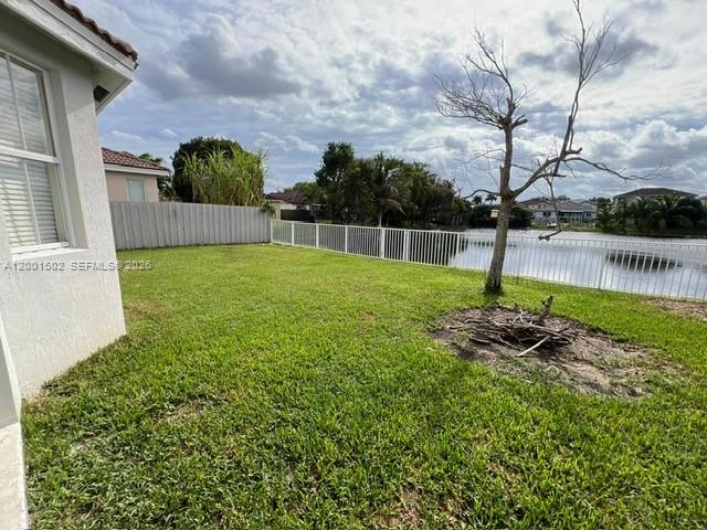 16568 Southwest 54th Street Miami, FL 33185 - Photo 26 of 30 a backyard of a house with lots of green space
