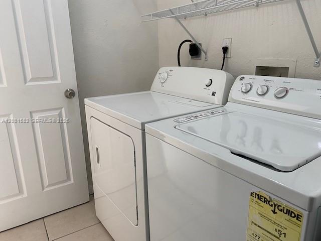 16568 Southwest 54th Street Miami, FL 33185 - Photo 28 of 30 a utility room with dryer and washer