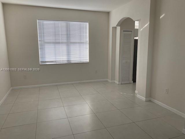 16568 Southwest 54th Street Miami, FL 33185 - Photo 6 of 30 a view of an empty room with a window