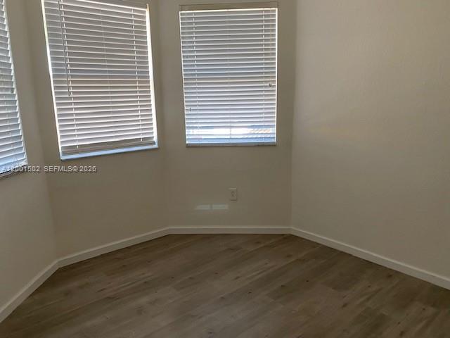16568 Southwest 54th Street Miami, FL 33185 - Photo 9 of 30 an empty room with a window