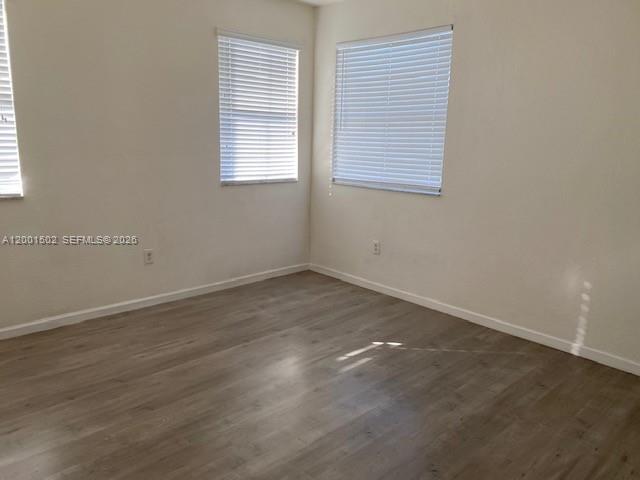 16568 Southwest 54th Street Miami, FL 33185 - Photo 10 of 30 an empty room with a window