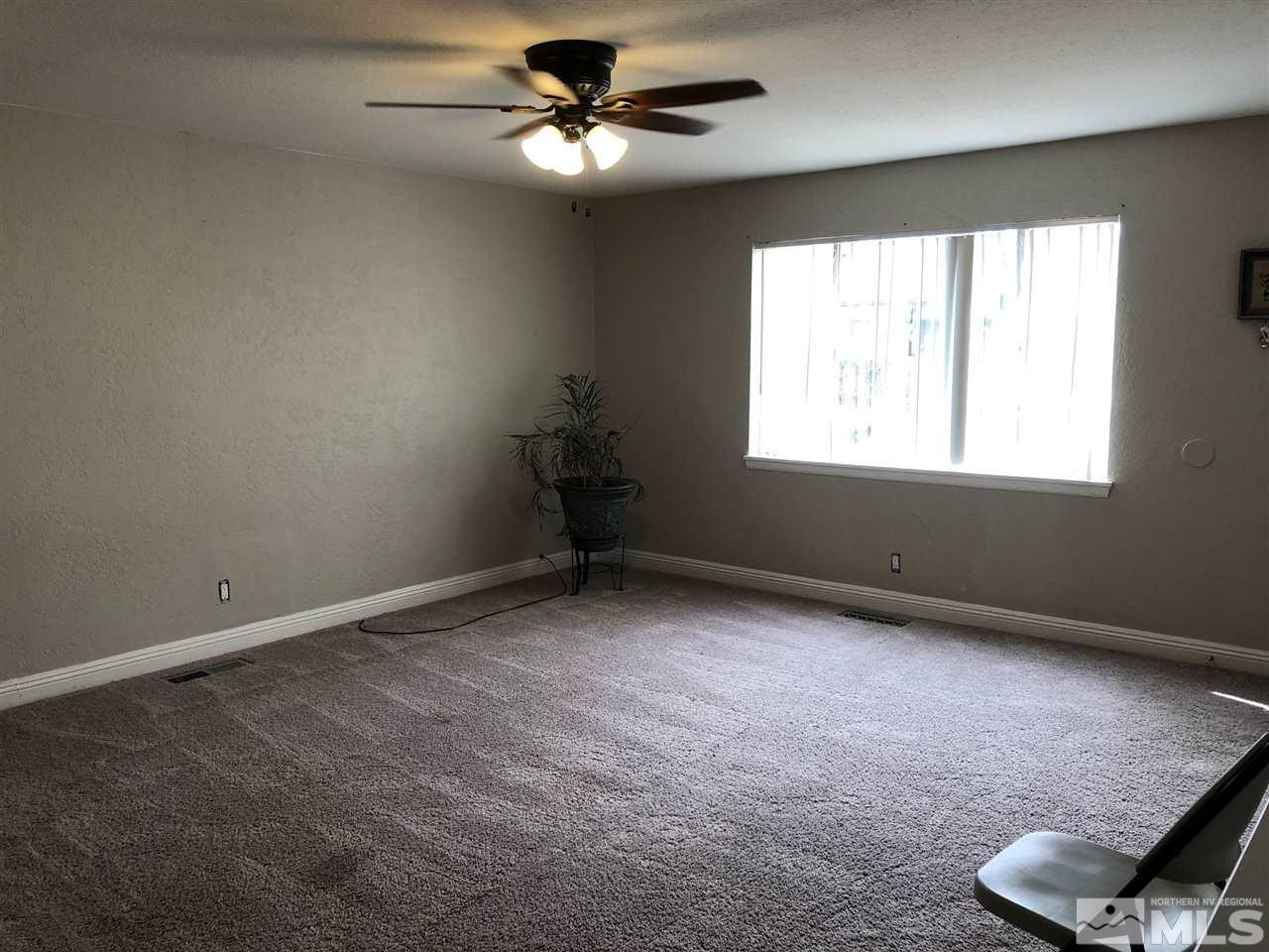 1230 Wilkinson Avenue Reno, NV 89502 - Photo 7 of 12 a view of an empty room with a window