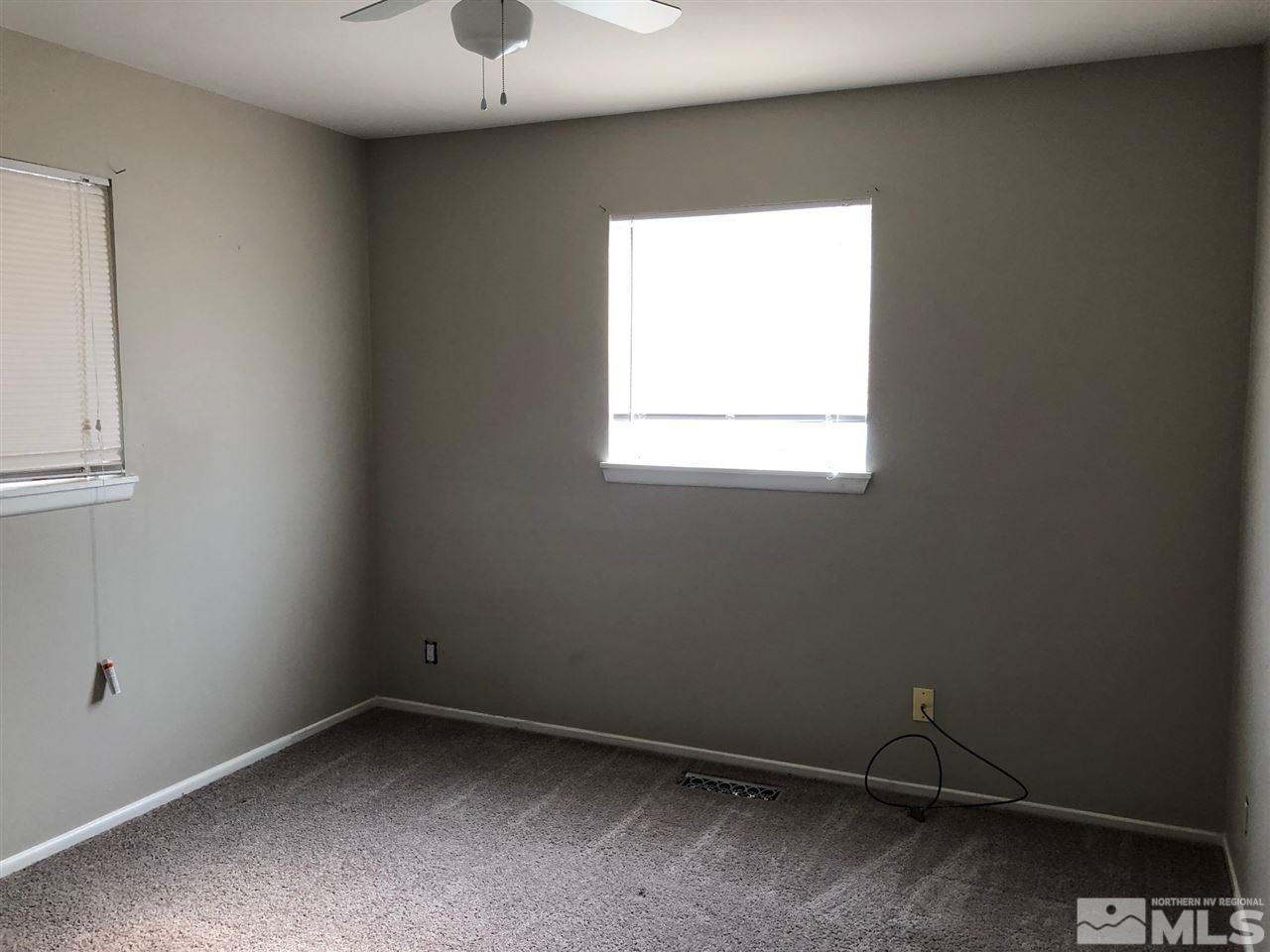 1230 Wilkinson Avenue Reno, NV 89502 - Photo 9 of 12 an empty room with a window