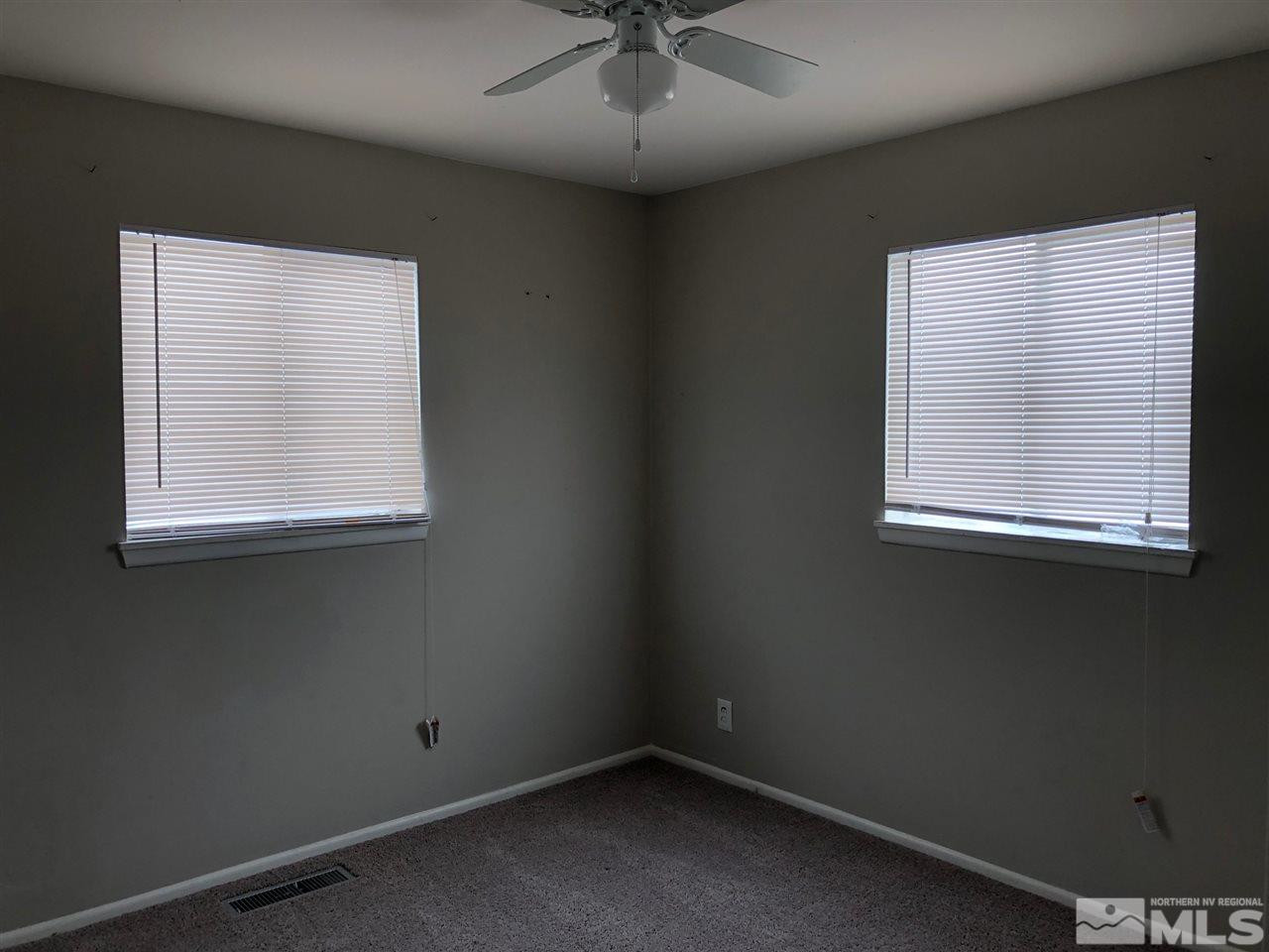 1230 Wilkinson Avenue Reno, NV 89502 - Photo 10 of 12 an empty room with a window