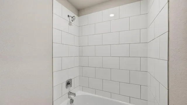 an empty room with closet area