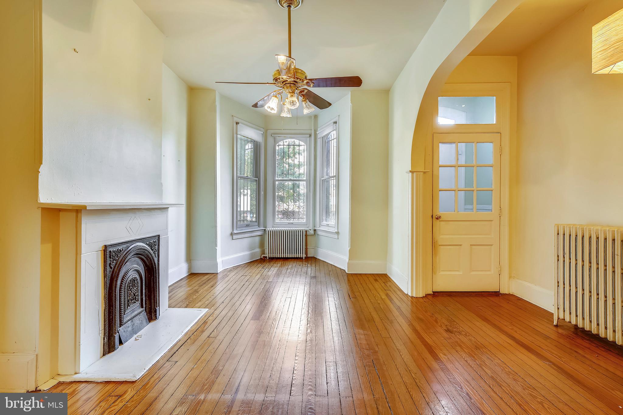 241 8th Street Northeast Washington, DC 20002 - Photo 2 of 29 Foyer and Living Room w/Fireplace