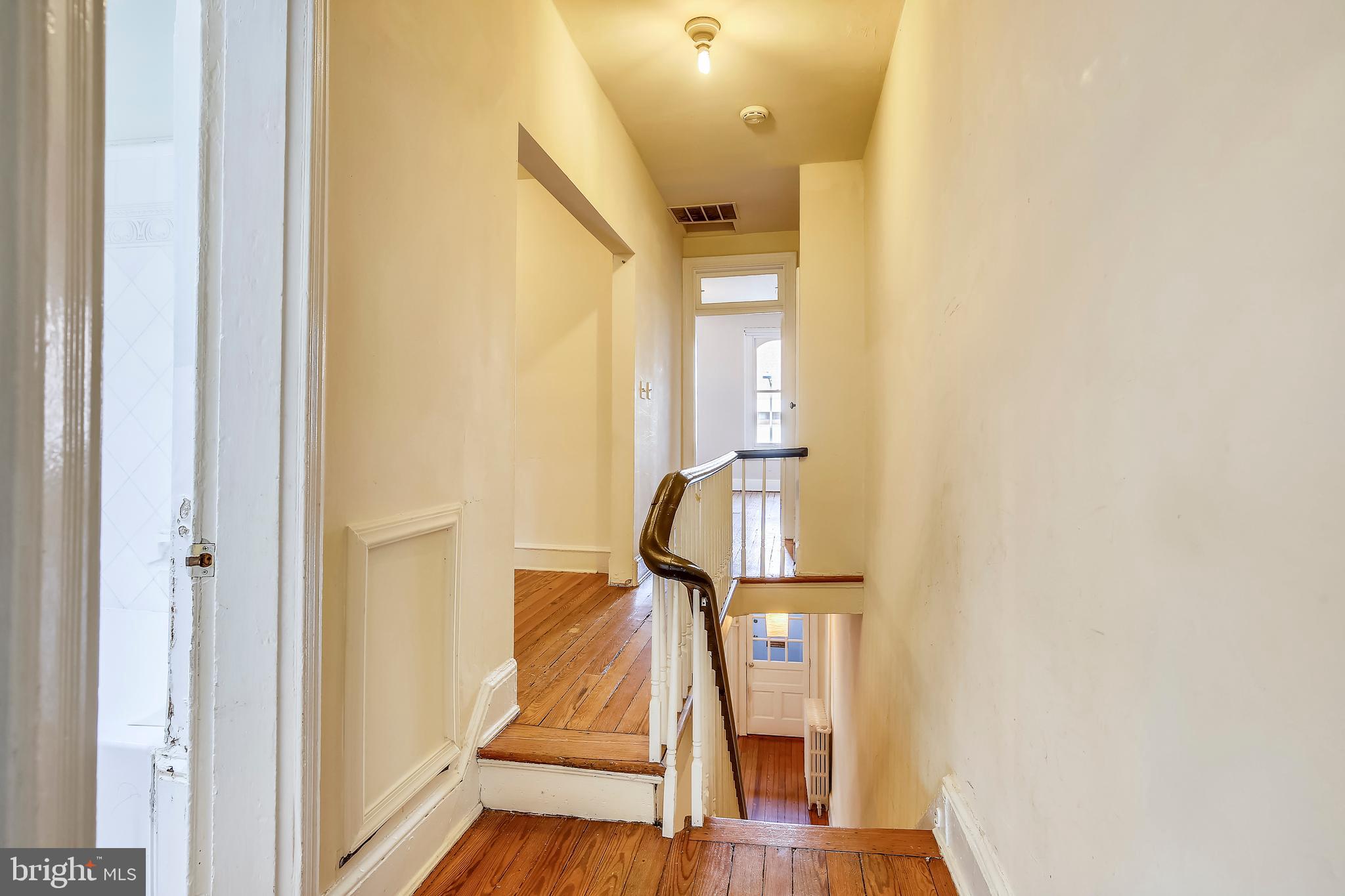 241 8th Street Northeast Washington, DC 20002 - Photo 9 of 29 Upstairs Hallway with Classic Bannister