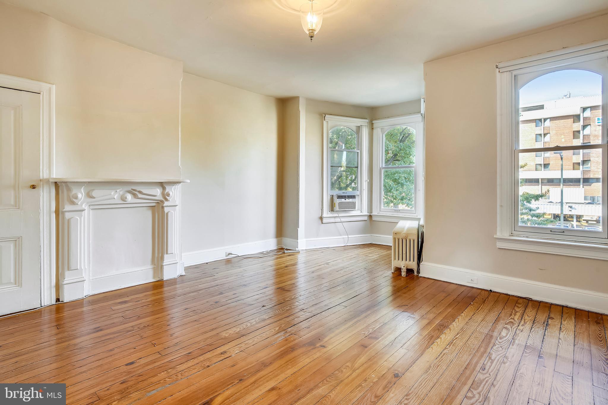241 8th Street Northeast Washington, DC 20002 - Photo 10 of 29 Large Sun-Drenched Master Bedroom/Sitting Area