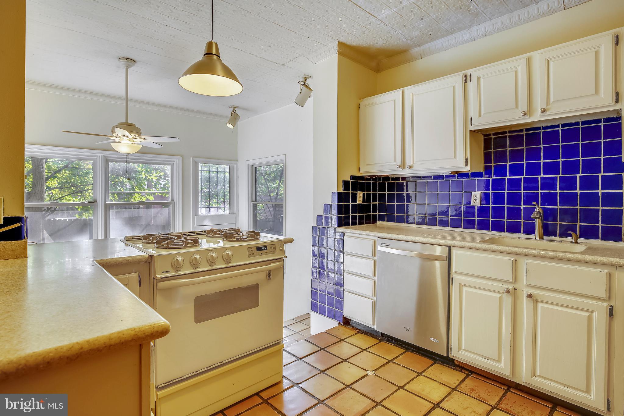 241 8th Street Northeast Washington, DC 20002 - Photo 4 of 29 Sunlit Working Kitchen Overlooking Family Room