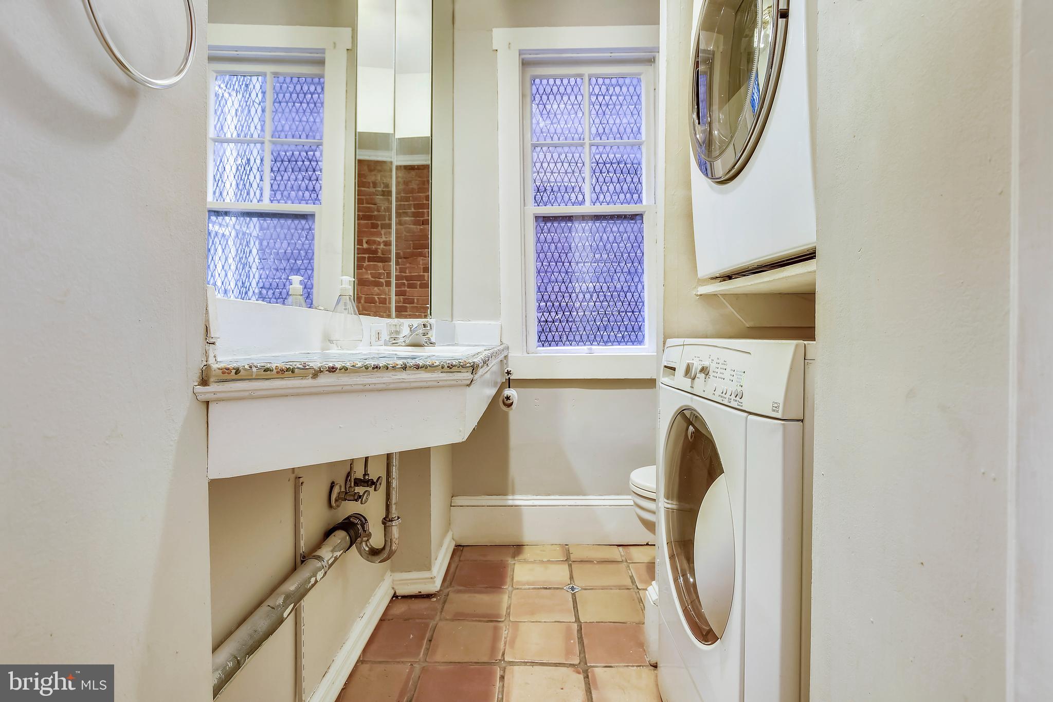 241 8th Street Northeast Washington, DC 20002 - Photo 8 of 29 1st Floor Powder Room with Washer/Cryer