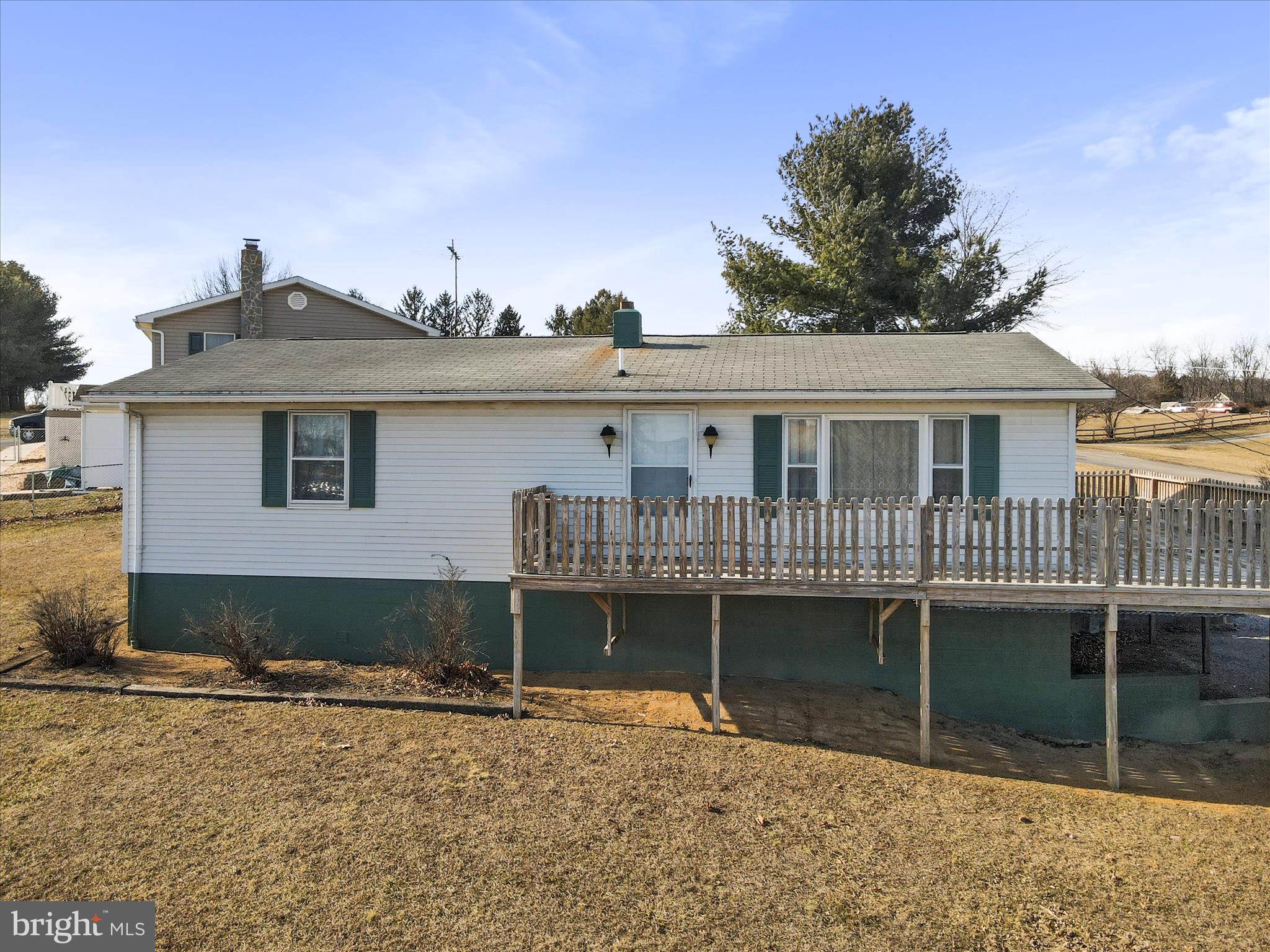 101 Carvers Way Falling Waters, WV 25419 - Photo 2 of 37 a front view of a house with a yard and garage