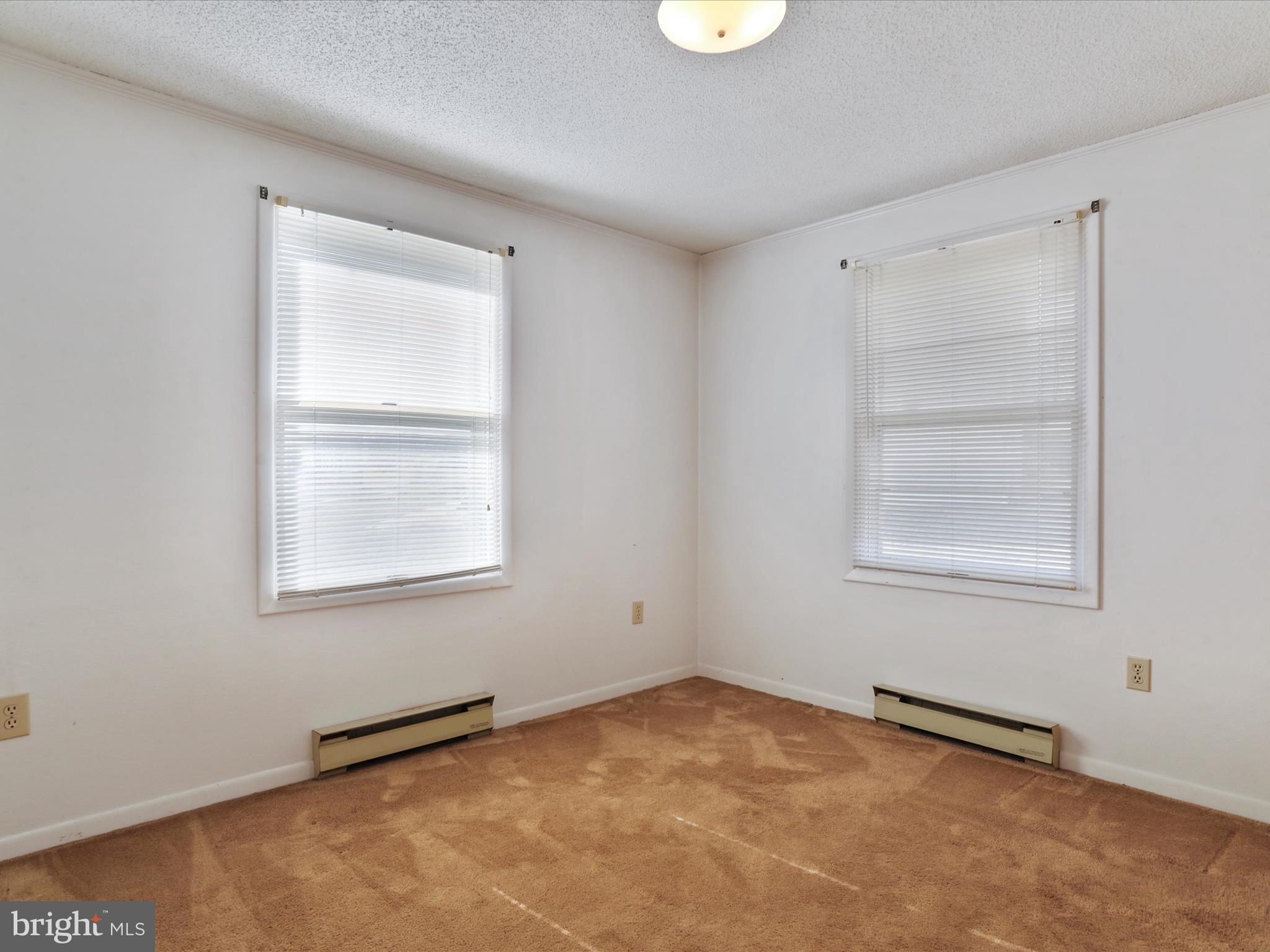 101 Carvers Way Falling Waters, WV 25419 - Photo 21 of 37 an empty room with windows