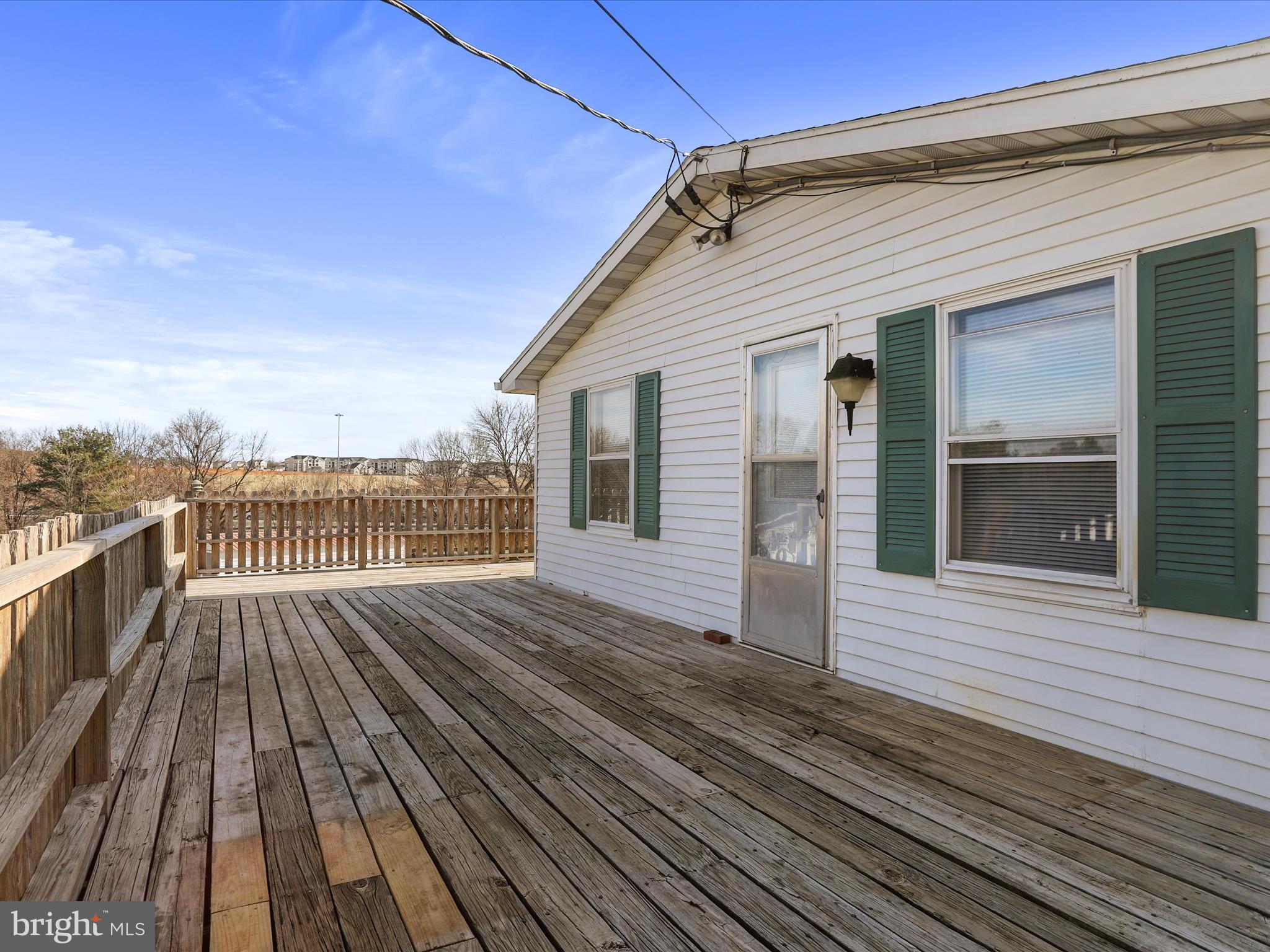 101 Carvers Way Falling Waters, WV 25419 - Photo 26 of 37 a view of deck with wooden floor and fence