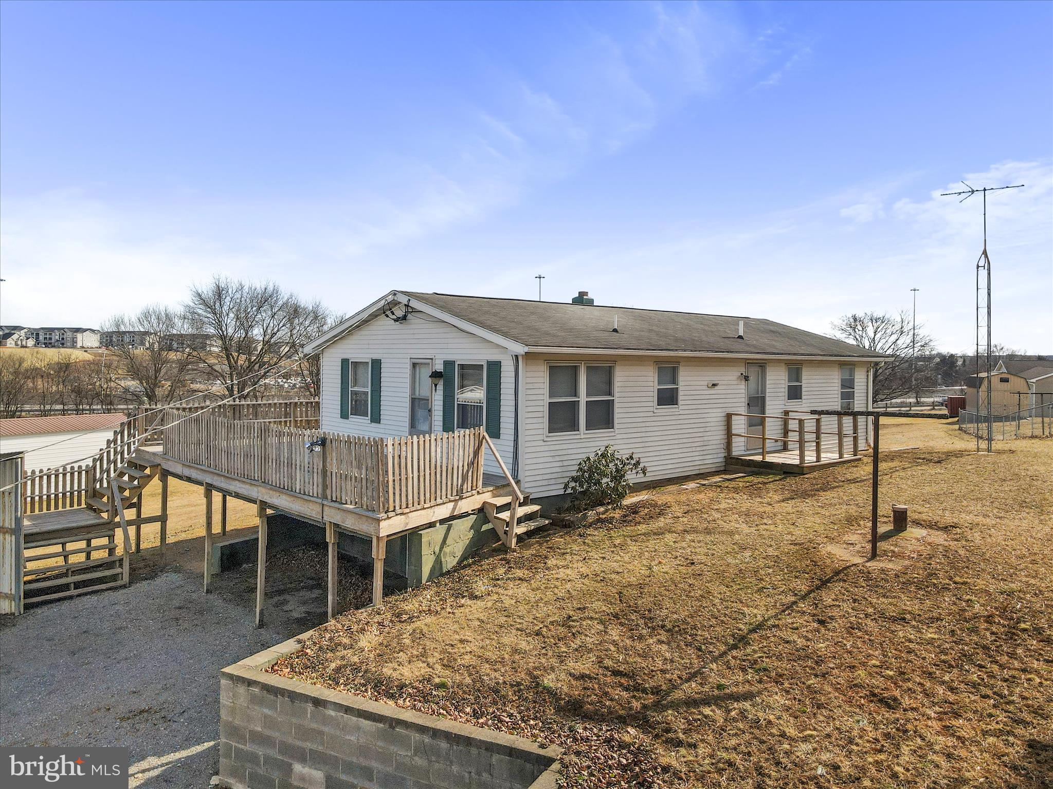 101 Carvers Way Falling Waters, WV 25419 - Photo 30 of 37 a view of a house with backyard and sitting area