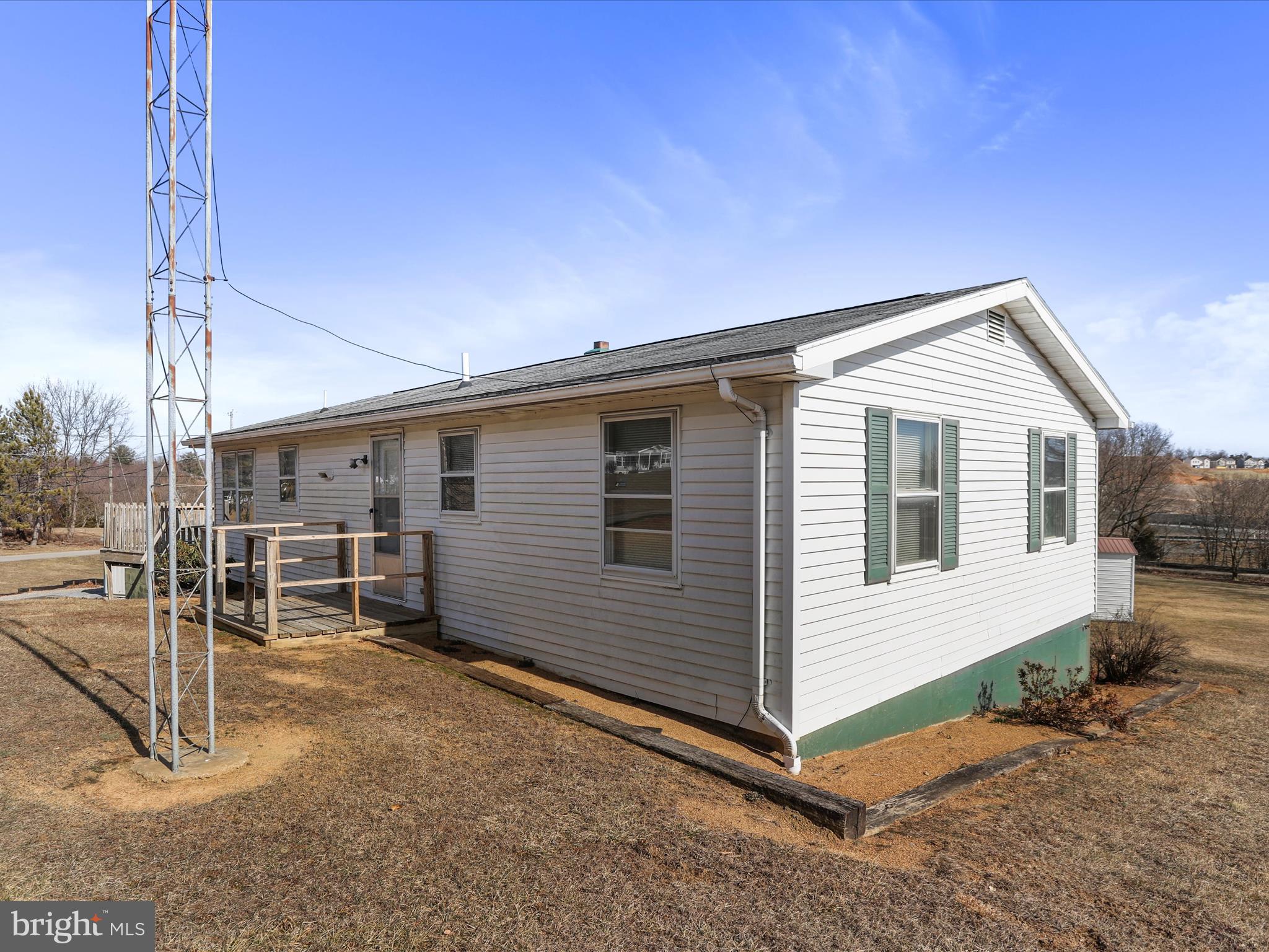 101 Carvers Way Falling Waters, WV 25419 - Photo 32 of 37 a view of house with backyard and sitting area