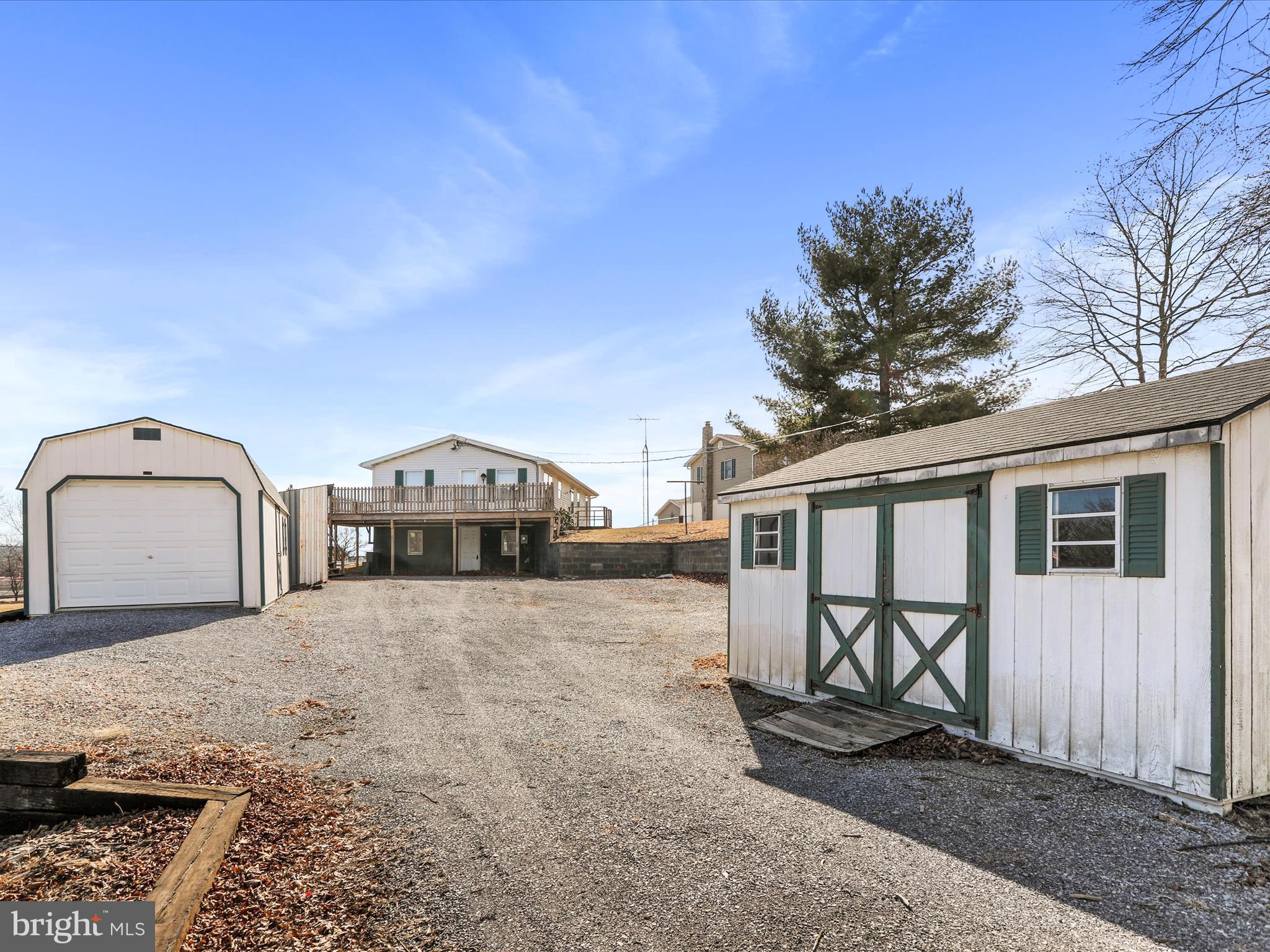 101 Carvers Way Falling Waters, WV 25419 - Photo 34 of 37 a front view of a house with a yard