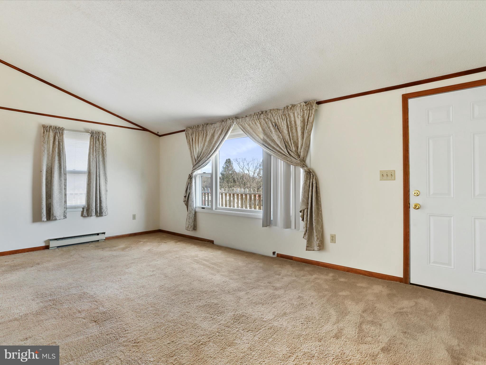 101 Carvers Way Falling Waters, WV 25419 - Photo 6 of 37 an empty room with windows
