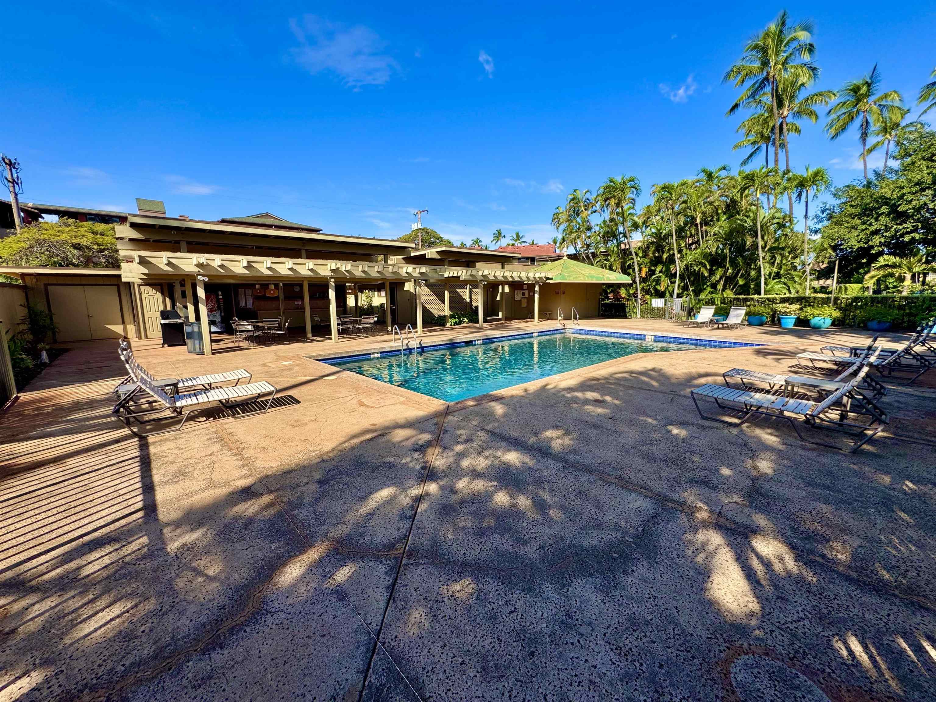 3559 Lower Honoapiilani Road, Unit 2D Lahaina, HI 96761 - Photo 11 of 16 a view of a house with a yard