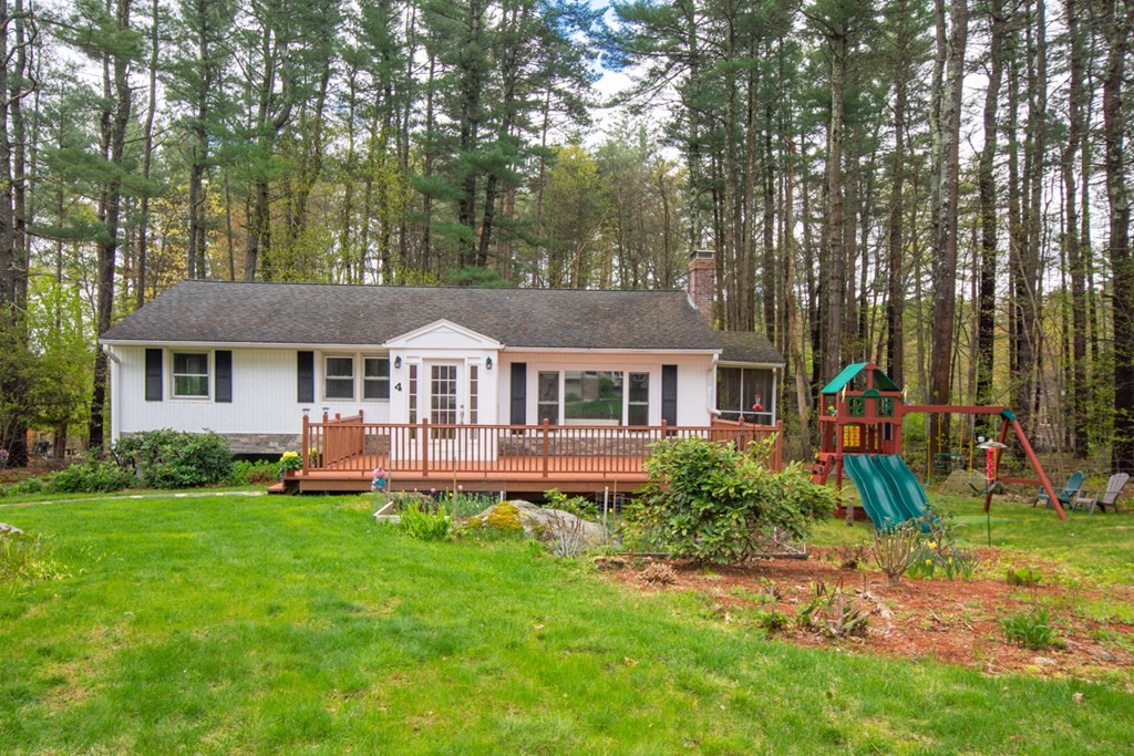 4 Duggan Road Acton, MA 01720 - Photo 1 of 21 front view of a house with a yard