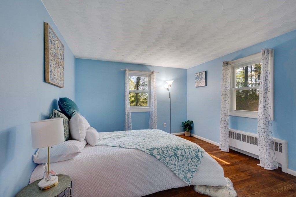 4 Duggan Road Acton, MA 01720 - Photo 12 of 21 a bedroom with a bed and a window