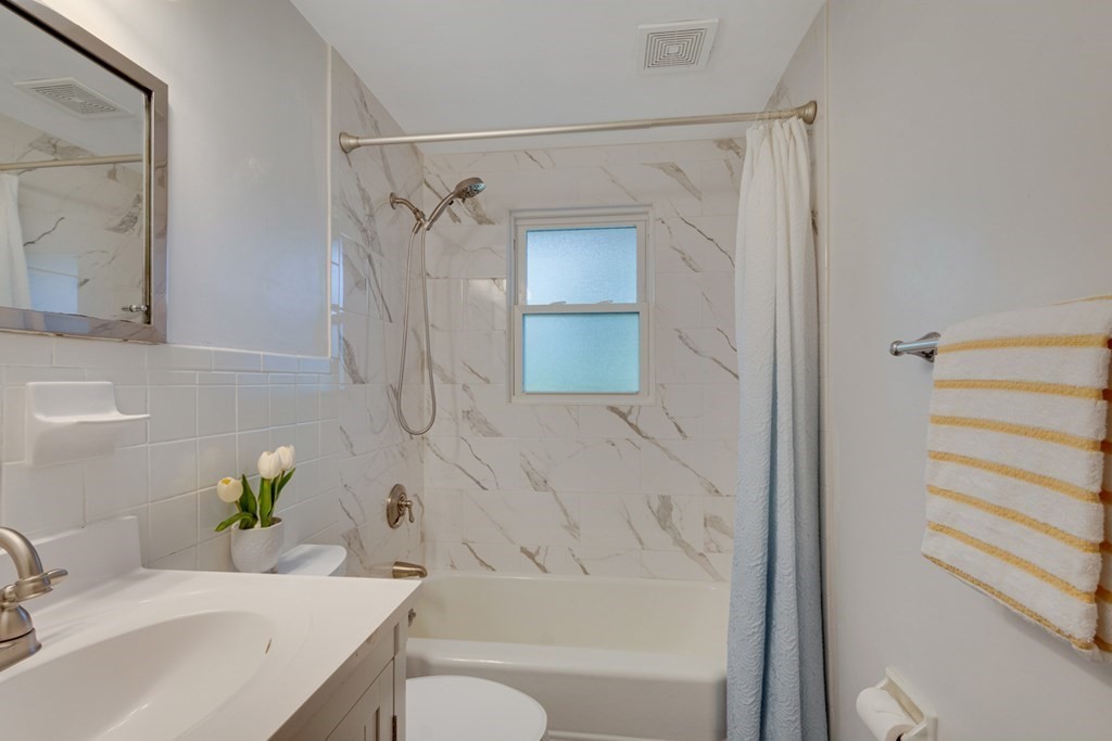 4 Duggan Road Acton, MA 01720 - Photo 15 of 21 a bathroom with a sink toilet and shower