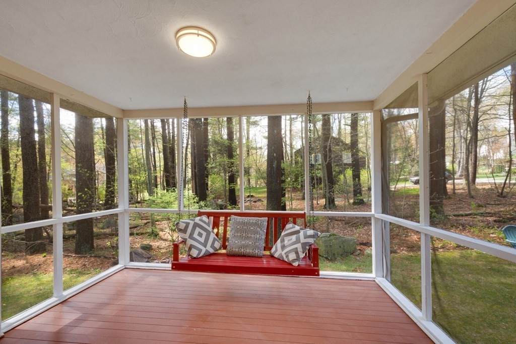 4 Duggan Road Acton, MA 01720 - Photo 18 of 21 a view of a living room and floor to ceiling window