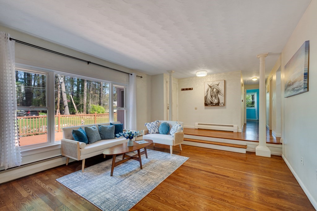 4 Duggan Road Acton, MA 01720 - Photo 5 of 21 a living room with furniture and a table