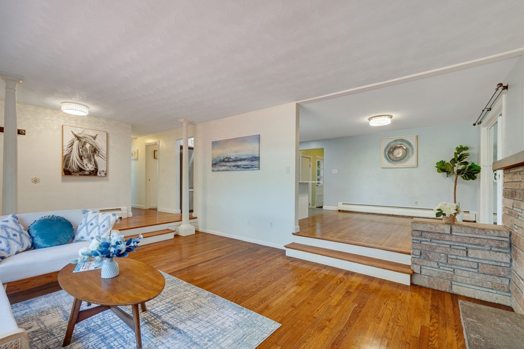 4 Duggan Road Acton, MA 01720 - Photo 6 of 21 a living room with furniture and wooden floor