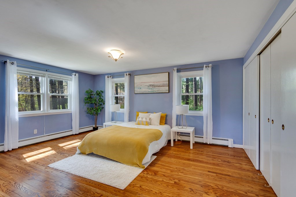 4 Duggan Road Acton, MA 01720 - Photo 9 of 21 a bedroom with a large bed and a window