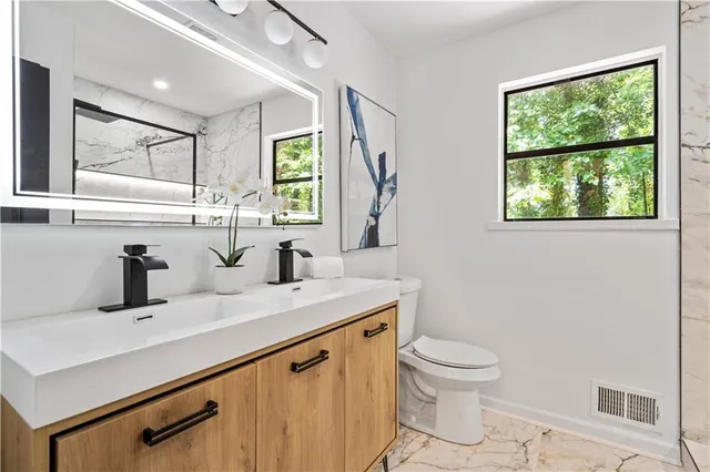 a view of a bathroom with a shower
