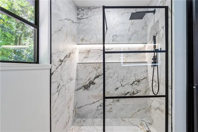 a bedroom with a bed and a table