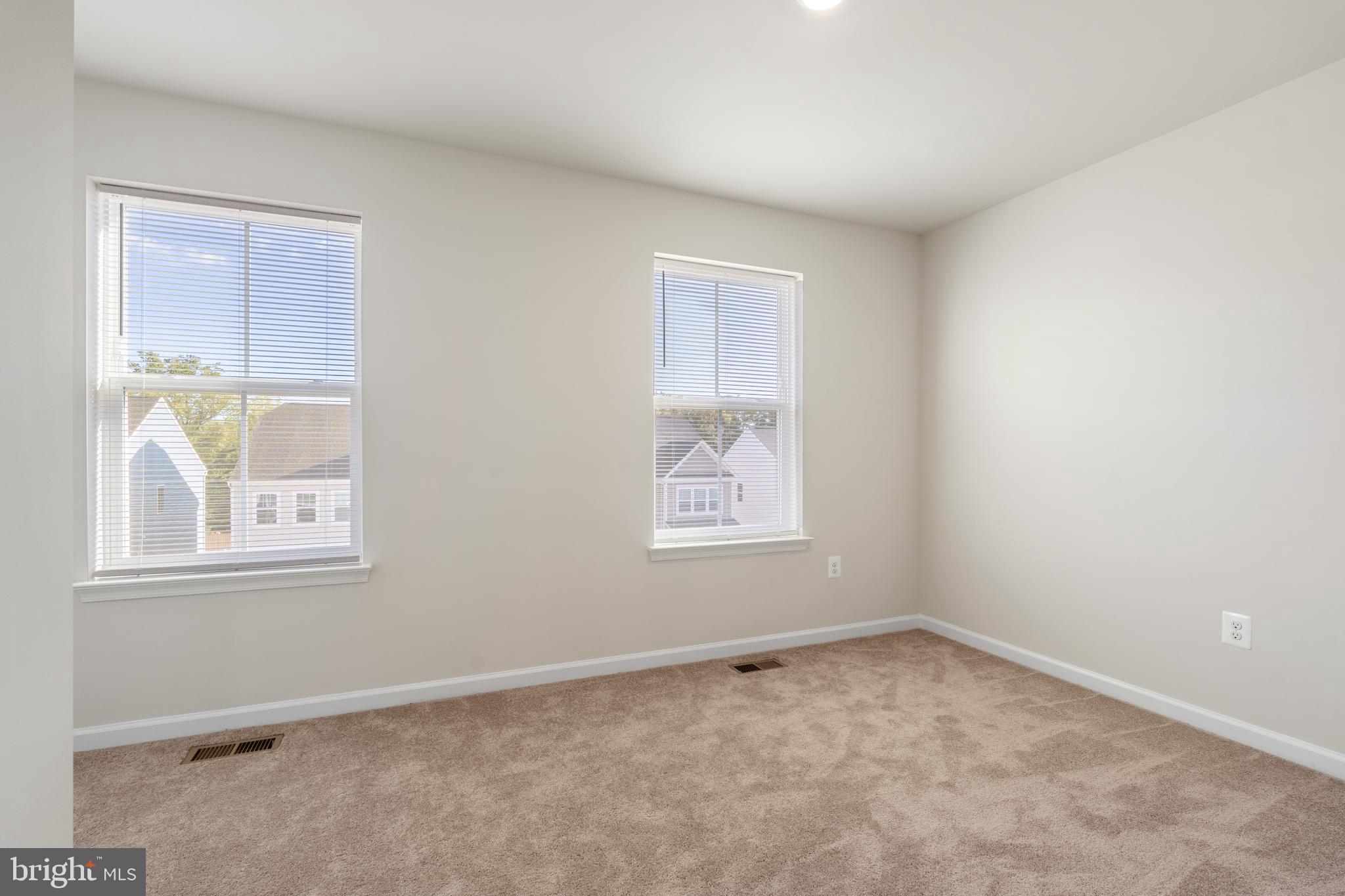 271 Sandy Btm Circle Ranson, WV 25438 - Photo 14 of 25 an empty room with a window