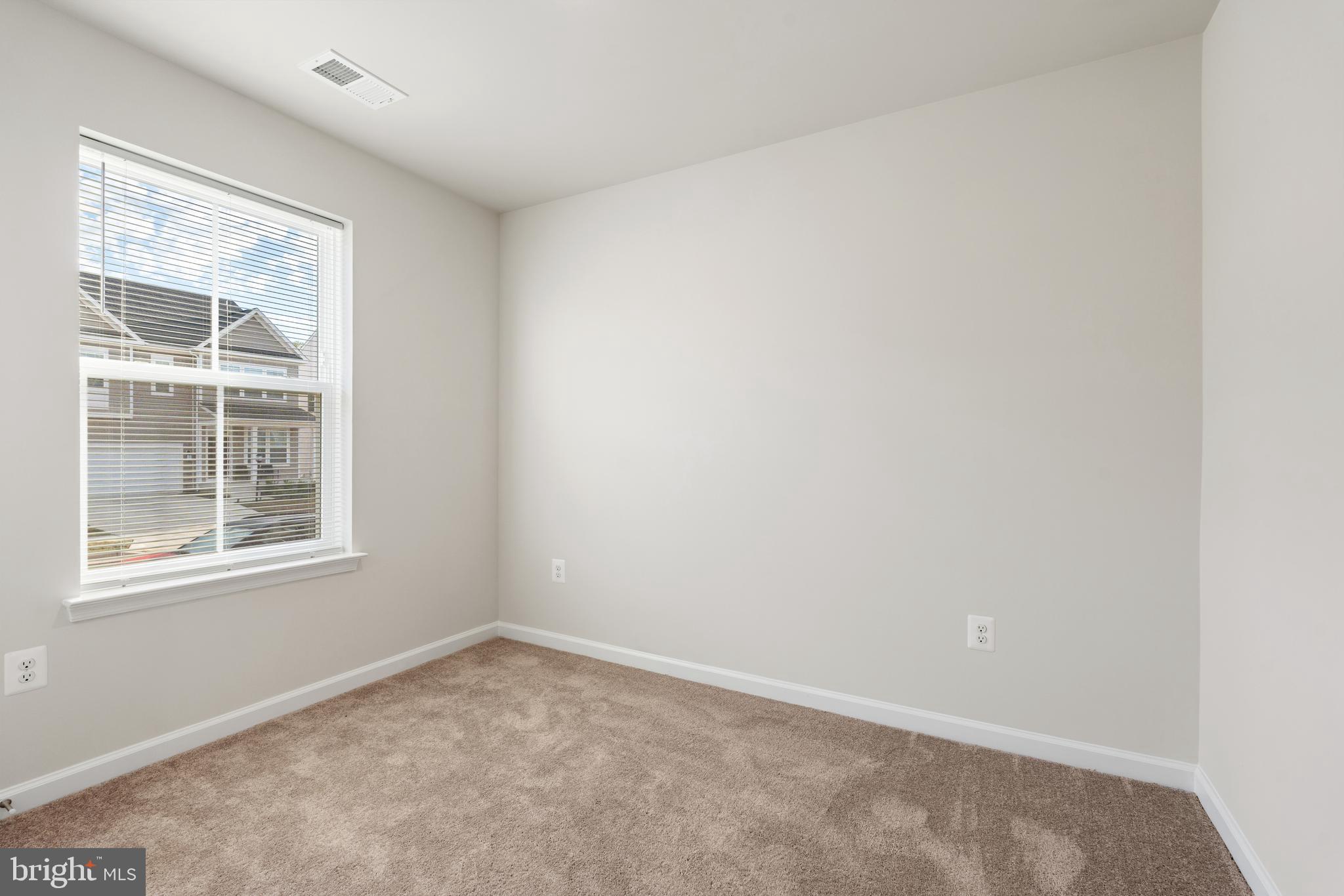 271 Sandy Btm Circle Ranson, WV 25438 - Photo 18 of 25 an empty room with a window