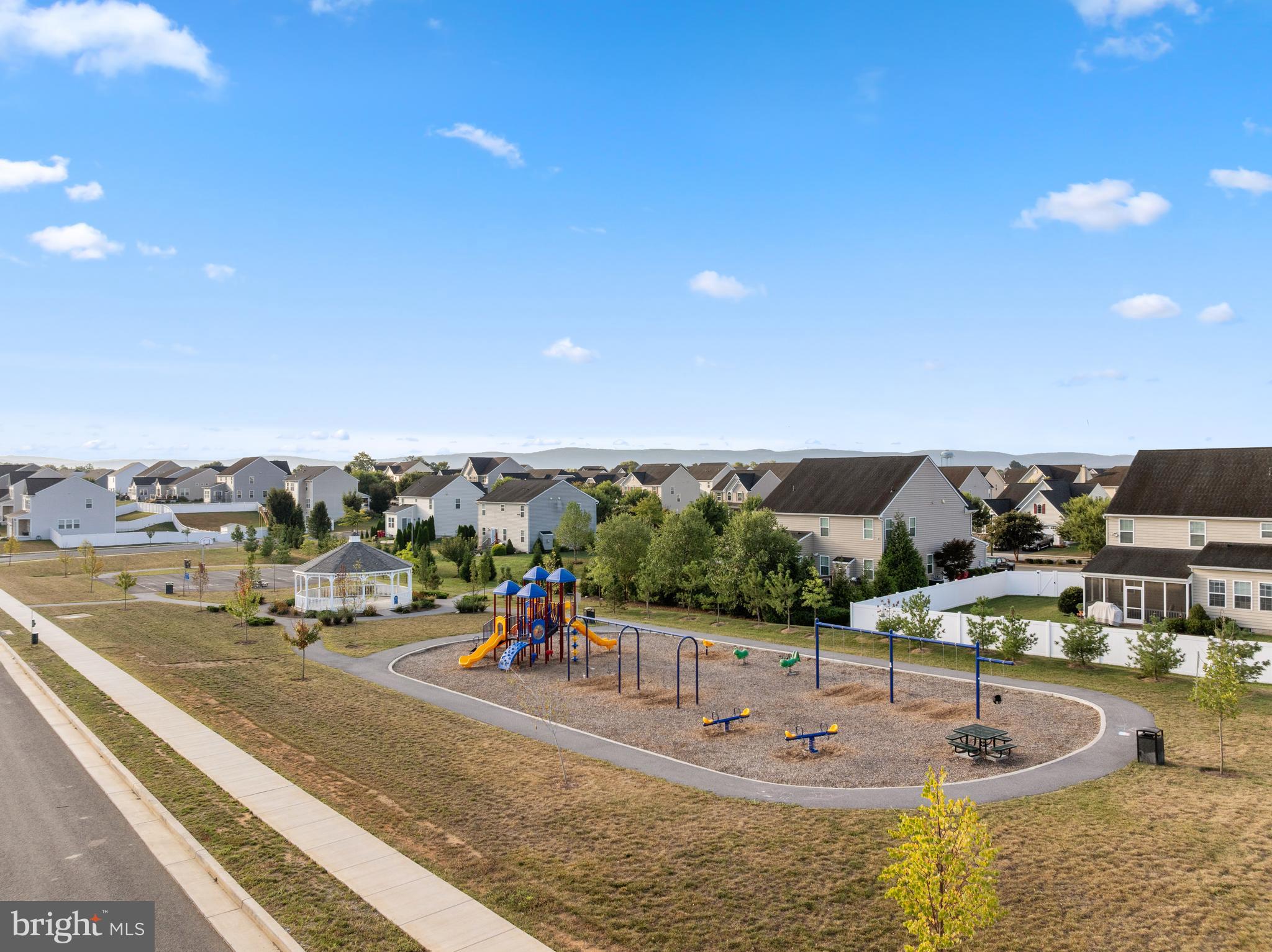 271 Sandy Btm Circle Ranson, WV 25438 - Photo 23 of 25 a view of a swimming pool with an ocean
