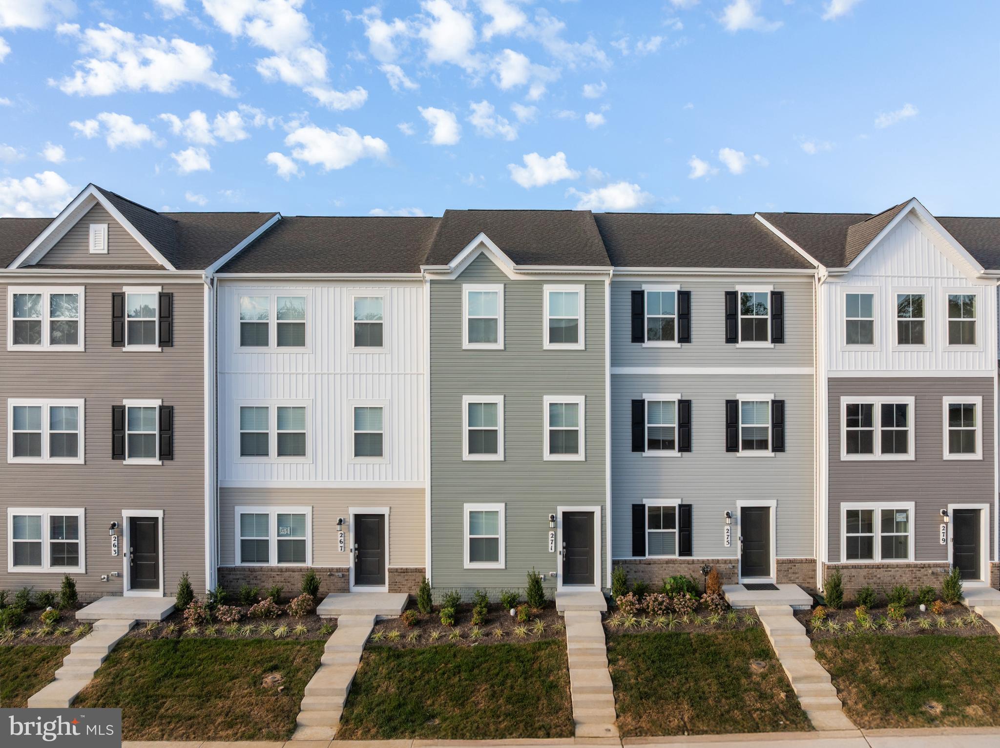 271 Sandy Btm Circle Ranson, WV 25438 - Photo 25 of 25 a front view of a house with a yard