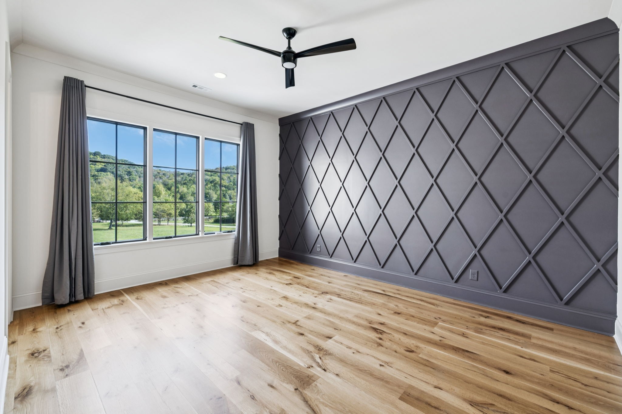 2245 Skinner Road Arrington, TN 37014 - Photo 62 of 98 a view of a room with sliding door and wooden floor