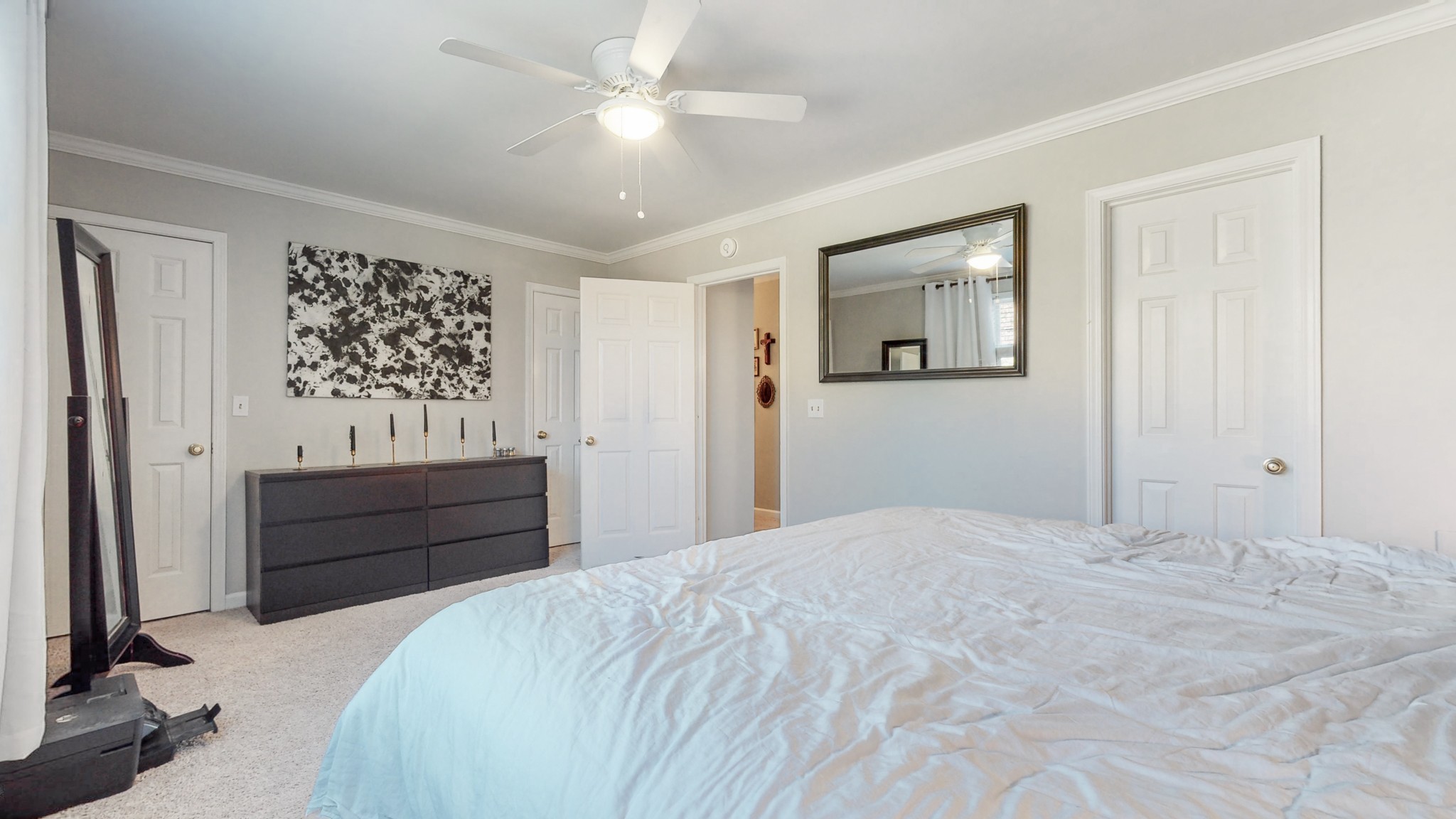 952 General George Patton Road Nashville, TN 37221 - Photo 20 of 26 a bedroom with a bed and a mirror