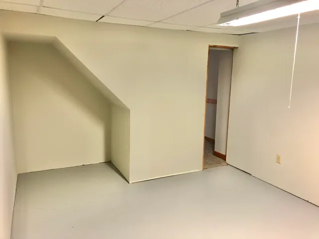 a view of a room with racks on the wall