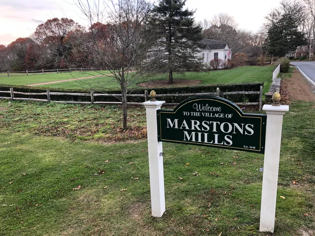 a sign that is on the side of the road