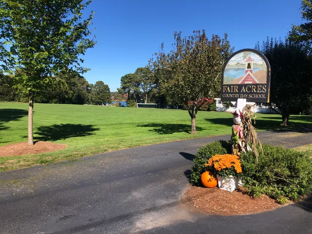 a view of a bench in front of house