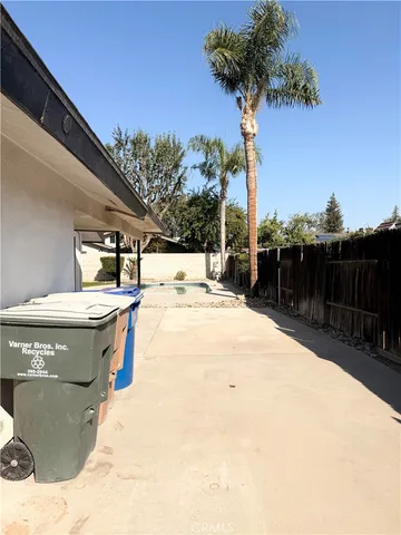 a street sign on a street next to a building