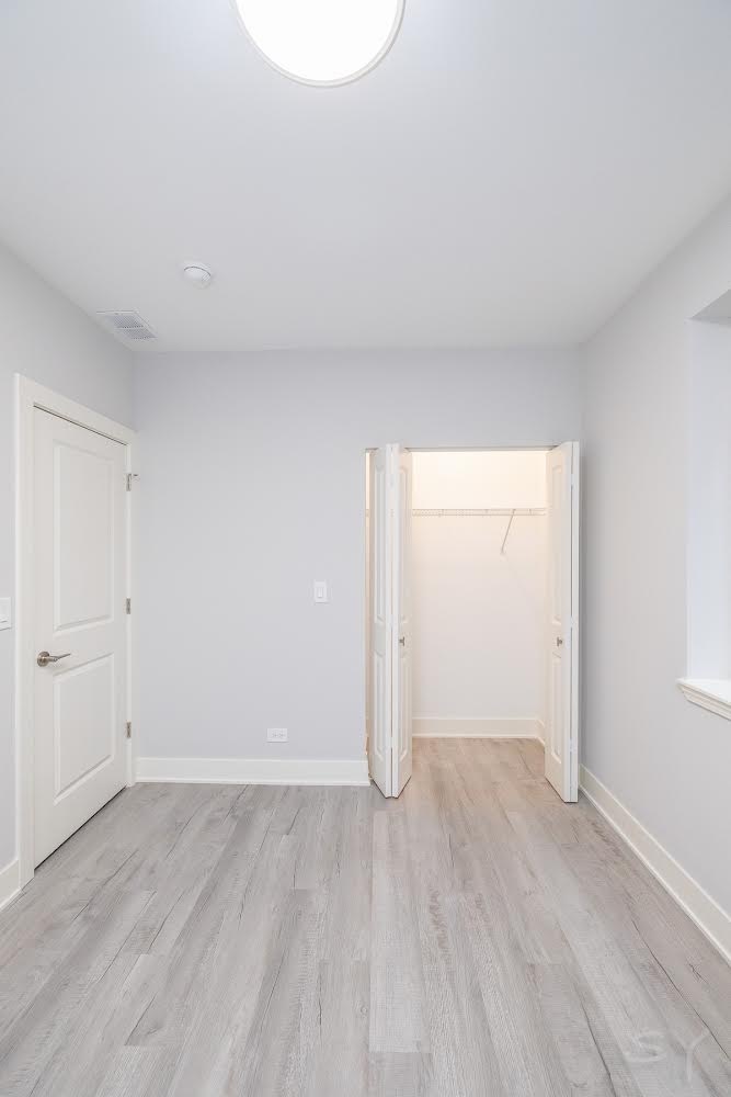 1232 South Fairfield Avenue, Unit 2 Chicago, IL 60608 - Photo 6 of 10 a view of an empty room