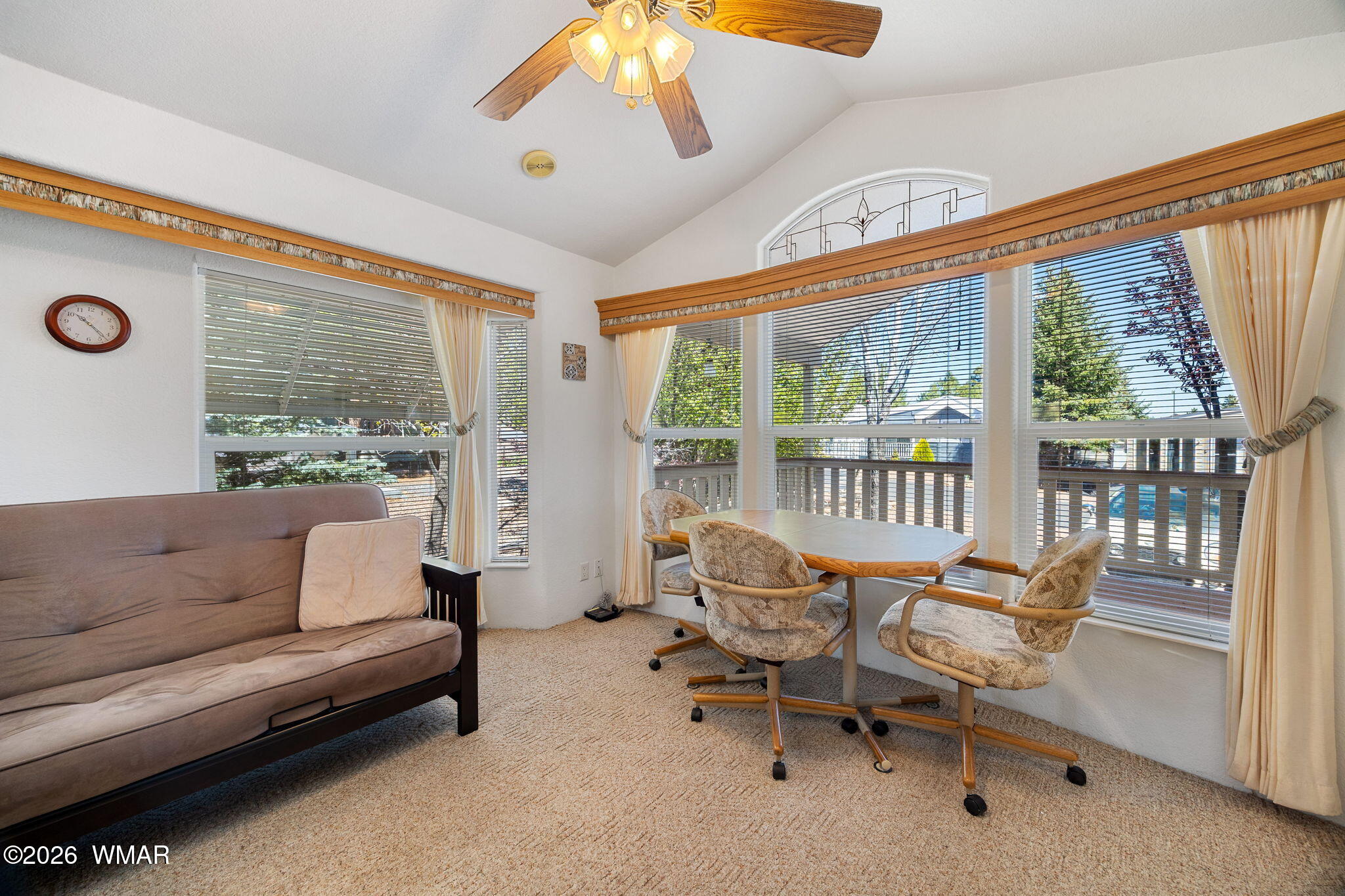 2221 Wrangler Way Overgaard, AZ 85933 - Photo 12 of 24 a living room with furniture and a large window
