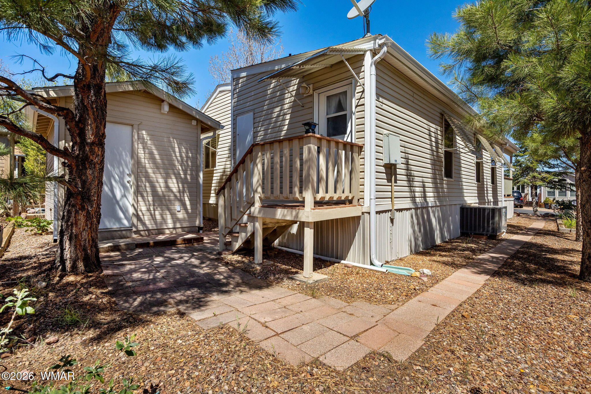 2221 Wrangler Way Overgaard, AZ 85933 - Photo 23 of 24 a view of a house with a yard