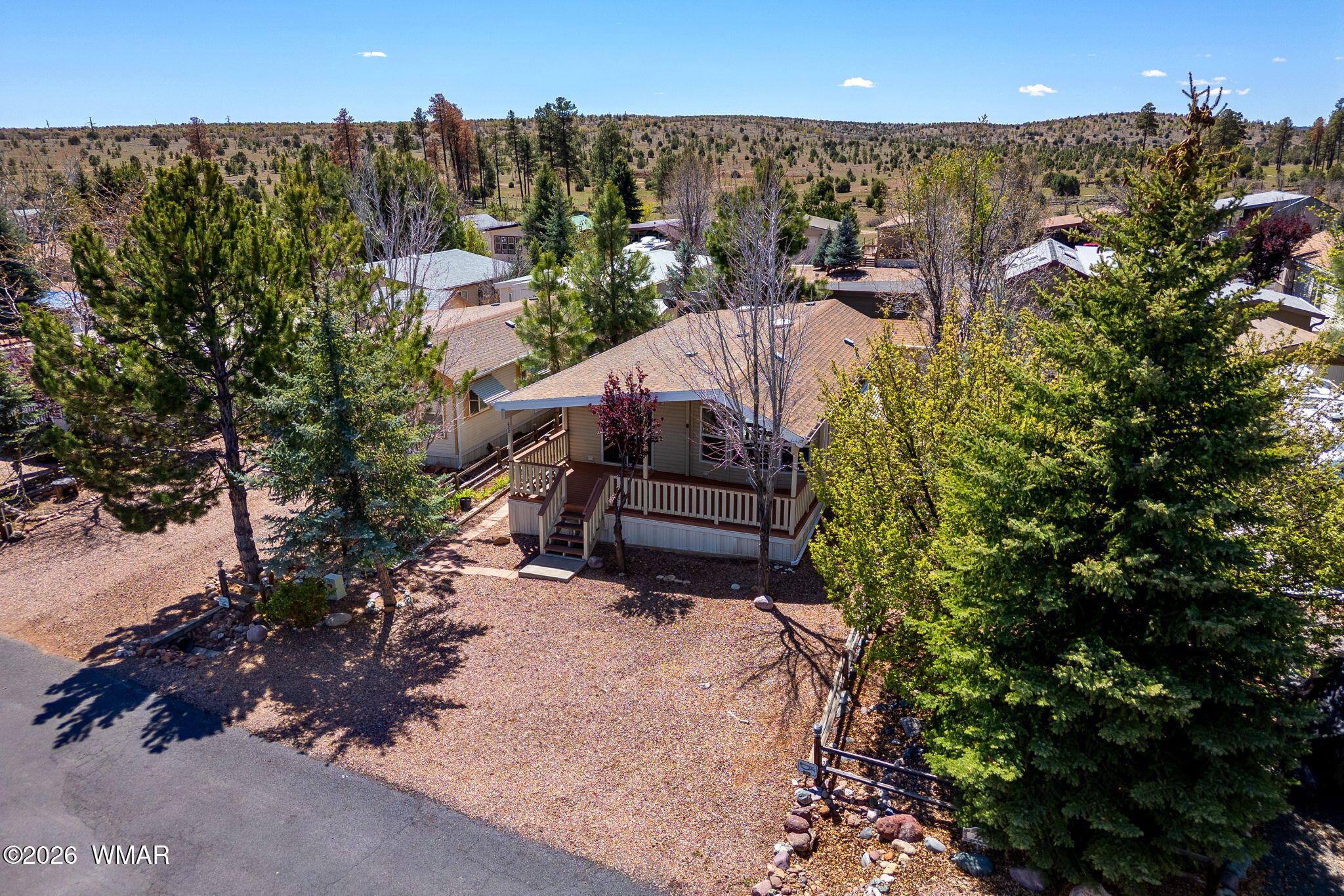 2221 Wrangler Way Overgaard, AZ 85933 - Photo 3 of 24 a view of a garden
